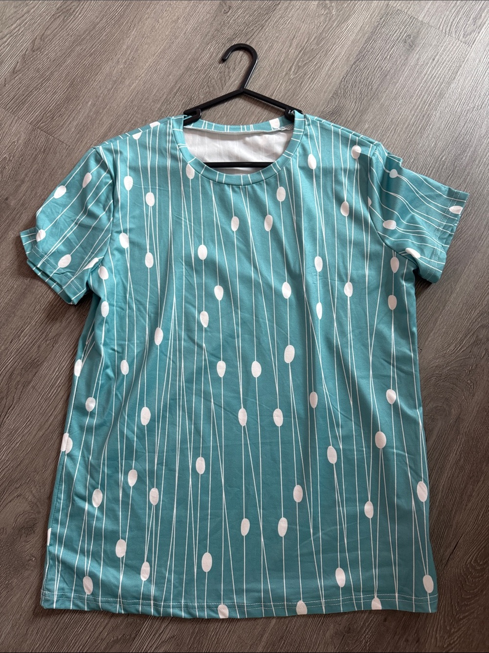 Women’s Teal Short-Sleeve Graphic Tee with White Dot Stripe Pattern
